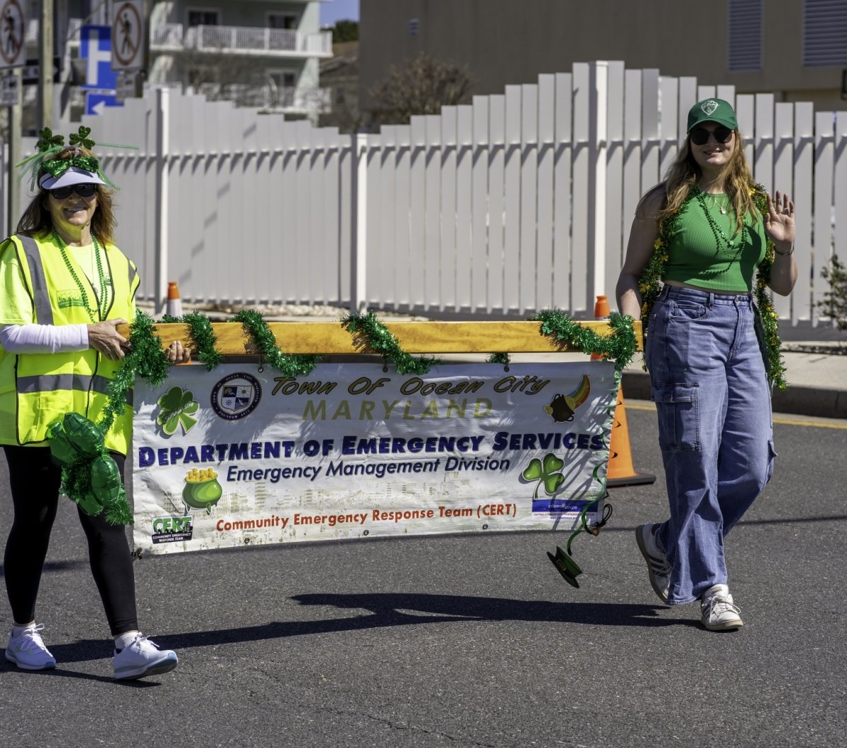 Girls holding parade banner